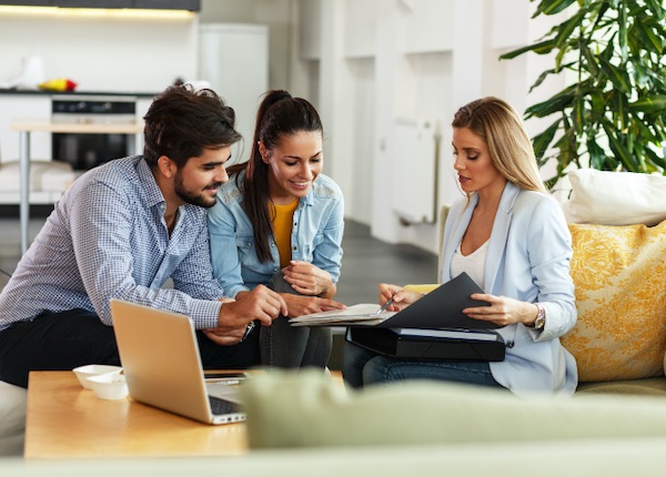A Swan Group advisor meeting a couple at home